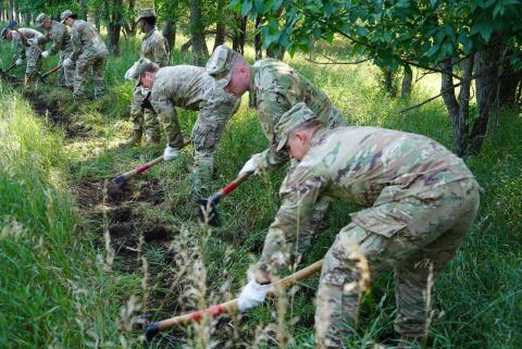 North Dakota National Guard constructing fireline in Bismarck. Photo Credit: Sgt. 1st Class Chad Highland, North Dakota National Guard.